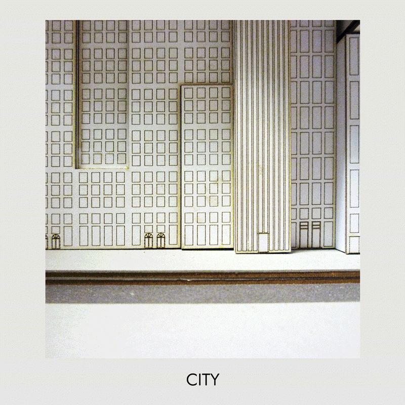 In the CITY, enclosures occur around iconic centrepieces – monuments that create community through collective celebration of the past. This is now not a room but an empty shell – experienced only through images and writing, not inhabitation.

The plaza, enclosed by towers, attempts to contain space and life but remains a void. 

Zooming out, the island city is an interior isolated by water. E.B White described Manhattan as “the poem whose magic is comprehensible to millions of permanent residents but whose full meaning will always remain elusive.” Just as solving this mystery also feels elusive, something slim and wooden is seen reflected in the waves. It is the table leg within the room!
